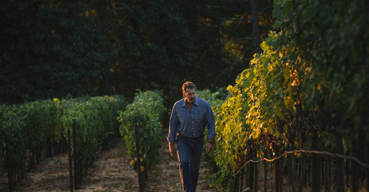 Winemaker Chris Carpenter walking in a Caladan vineyard.